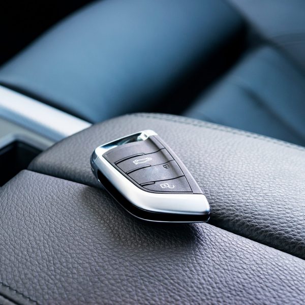 Car key fob on a vehicle seat